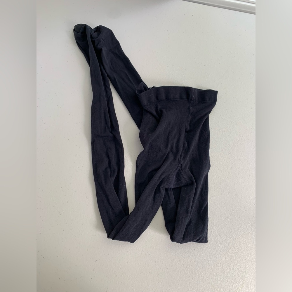 Wolford medium black tights with runs
